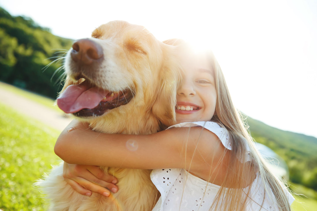 golden-retriever-girl-hug