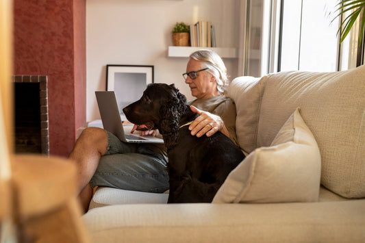 Elderly-man-working-with-senior-dog
