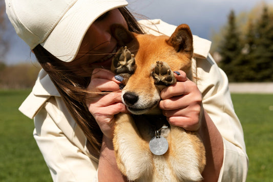 woman-holding-cute-dog